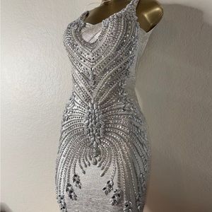 Silver Custom Rhinestone Embellished Dress with mermaid Bottom .